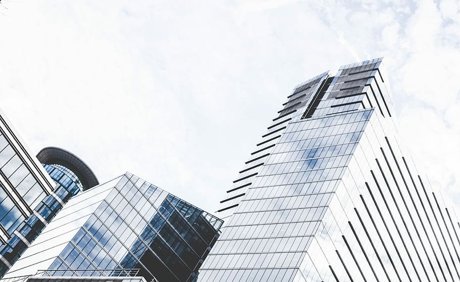low-angle photo of glass buildings, skyline, window, metal HD wallpaper