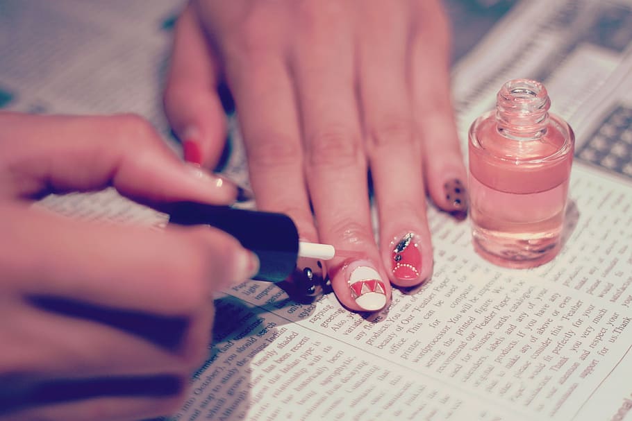 woman applying nail polish on hands, human Hand, manicure, women HD wallpaper