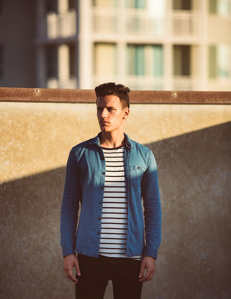 man's standing against wall, guy, fashion, jacket, buildings HD wallpaper