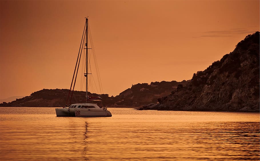 yacht cruising on body of water, white, sailboat, sunset, dusk HD wallpaper