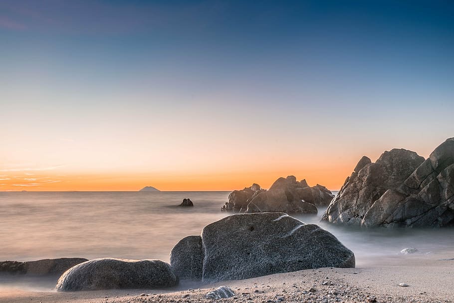 landscape photography of rocks, beach, wave, italy, stromboli HD wallpaper