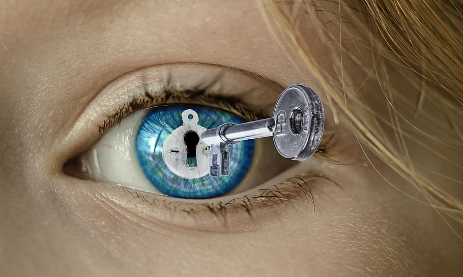silver skeleton key and blue eyes graphic animation display wallpaper HD wallpaper