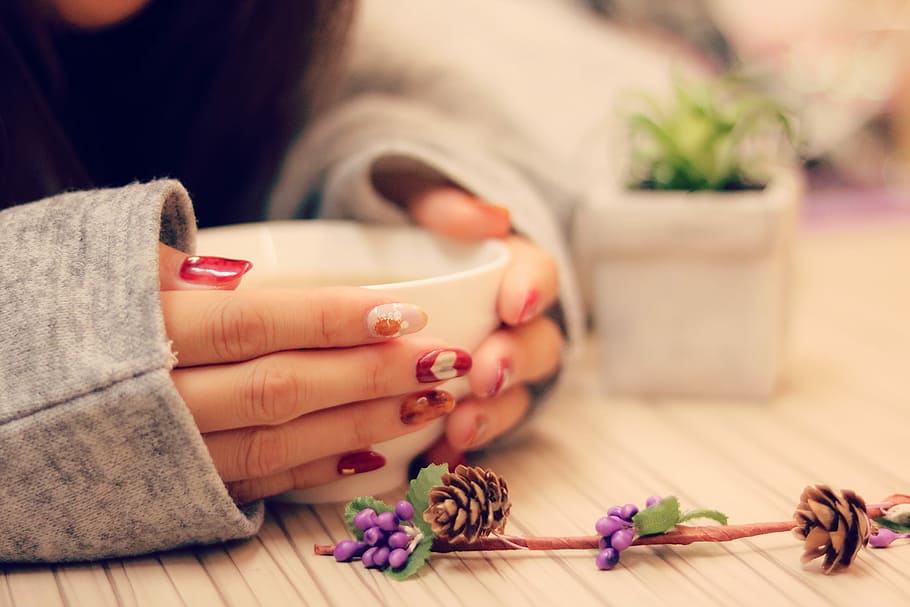 woman holding white ceramic cup, women, females, human Hand, table HD wallpaper