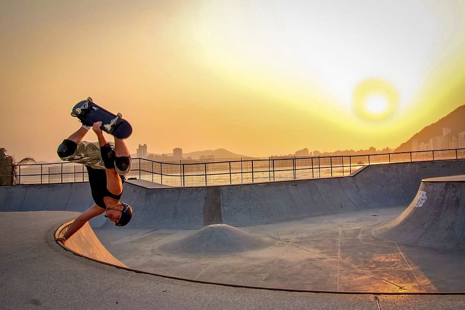 Man In Black Tank Top Skateboarding Wearing Helmet, action, dawn
