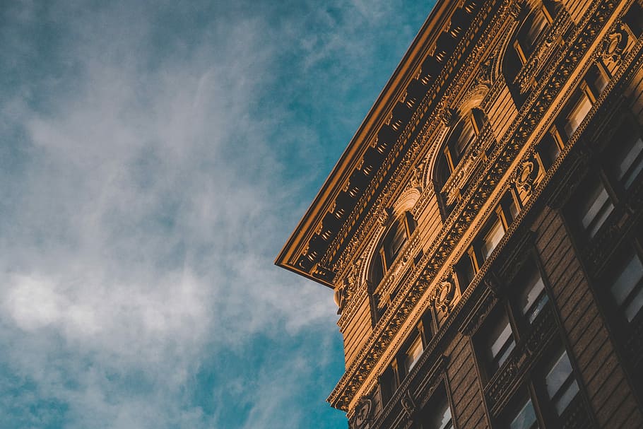worm's-eye view of brown building, low angle photo of brown concrete building HD wallpaper