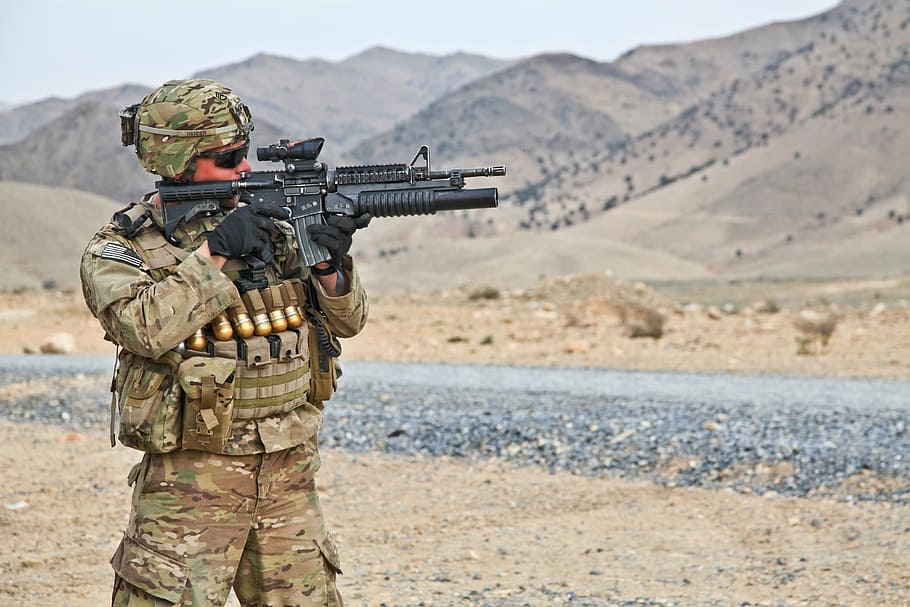 military man holding rifle in an open field, army, weapon, bullets