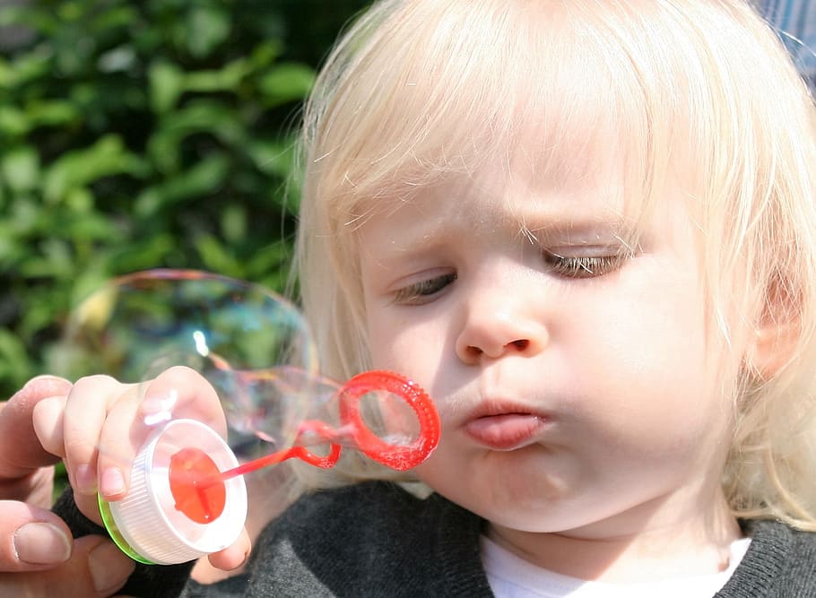 child blowing bubbles, soap bubbles, fun, face, funny, girl HD wallpaper