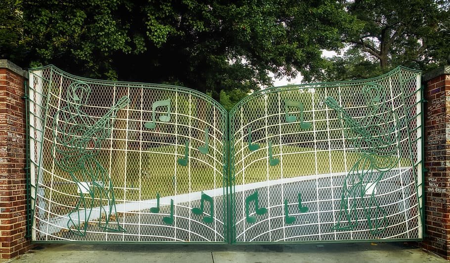 white and green metal gate, graceland, memphis, tennessee, gates