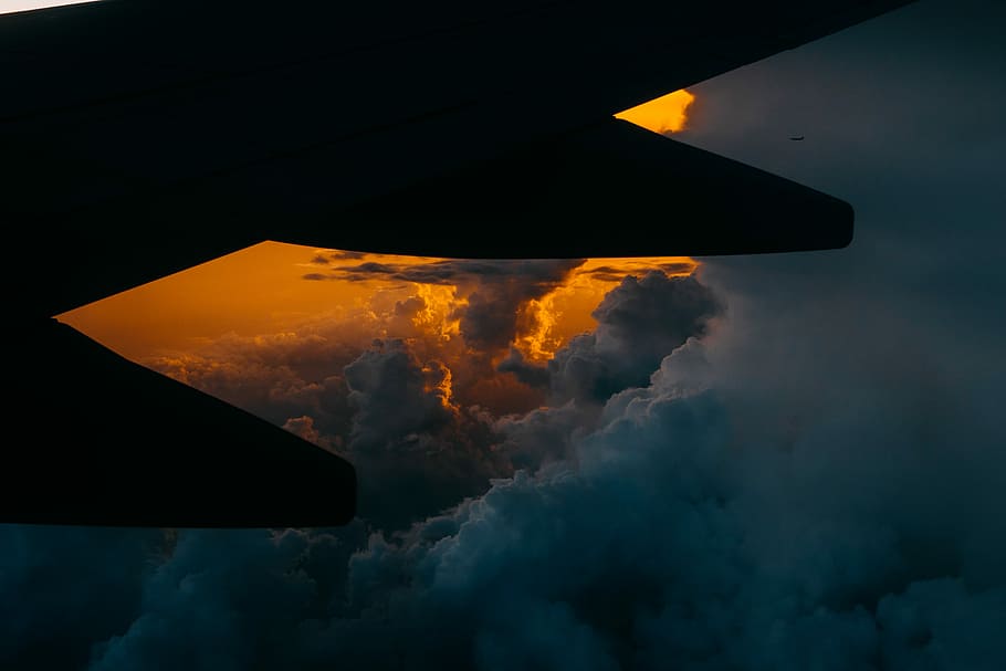 silhouette of jet, silhouette of airplane wing above the clouds HD wallpaper
