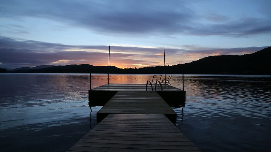 wooden dock during dawn, wharf, lake, sunset, sun loungers, mountains