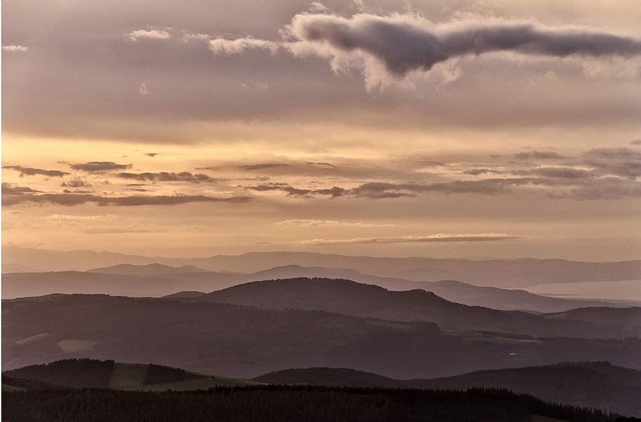 silhouette photography of mountain, mountain range under cloudy sky HD wallpaper