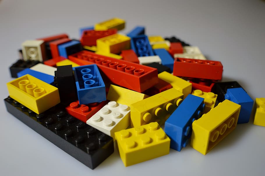 selective photo of building block lot, lego, children, toys, colorful