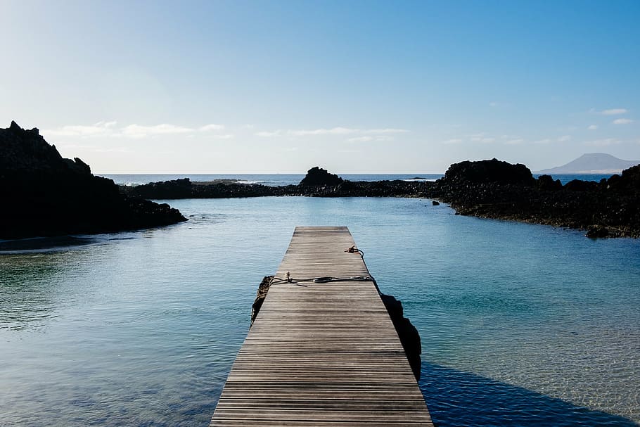 brown wooden port on blue body of water, dock, ocean, rocks HD wallpaper