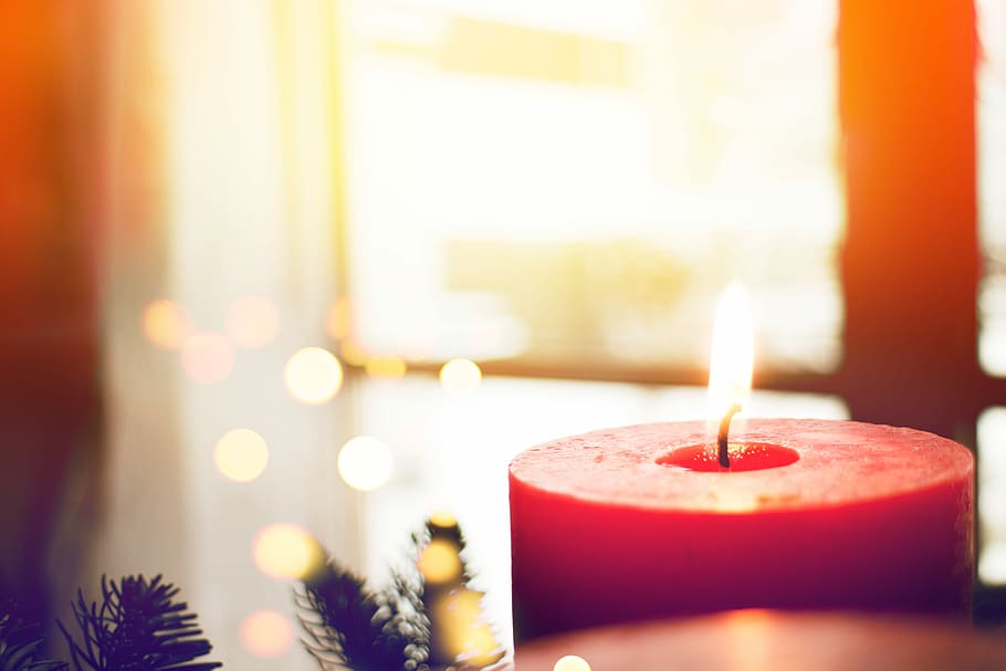 shallow focus photography of red candle, selective focus photography of lighted candle HD wallpaper