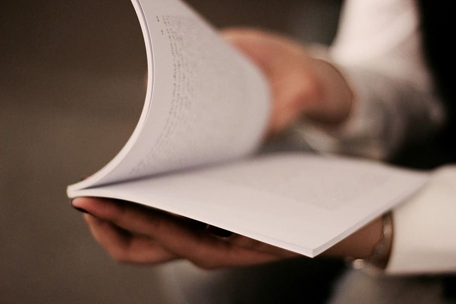 person holding book, person opening a book, notebook, writing HD wallpaper