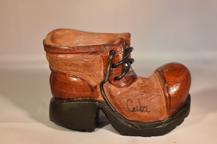 close-up photography of unpaired brown wooden shoe, Cuba, Boot HD wallpaper