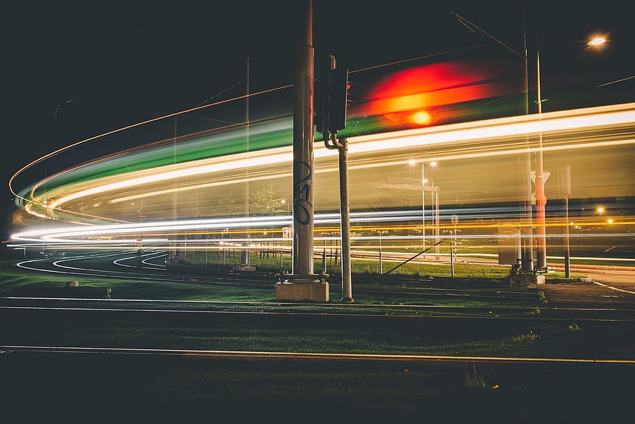 timelapse photography of post lamps at nighttime, timelapse photography of white and green building HD wallpaper