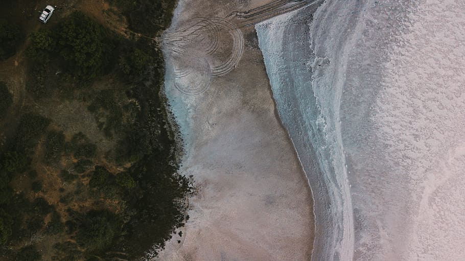 aerial photography of white vehicle running on rough road near shore, areal photography of seashore HD wallpaper
