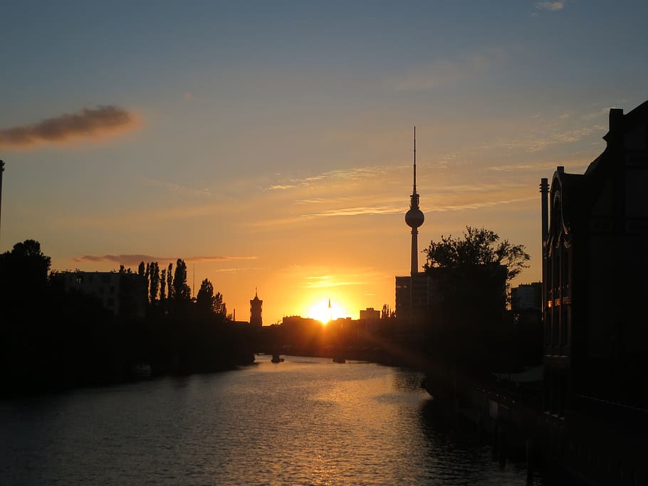 body of water between buildings at golden hour, berlin, germany HD wallpaper