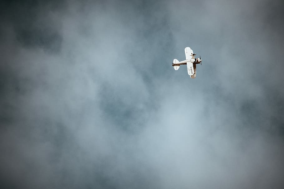white monoplane on sky, smoke - physical structure, cloud - sky HD wallpaper