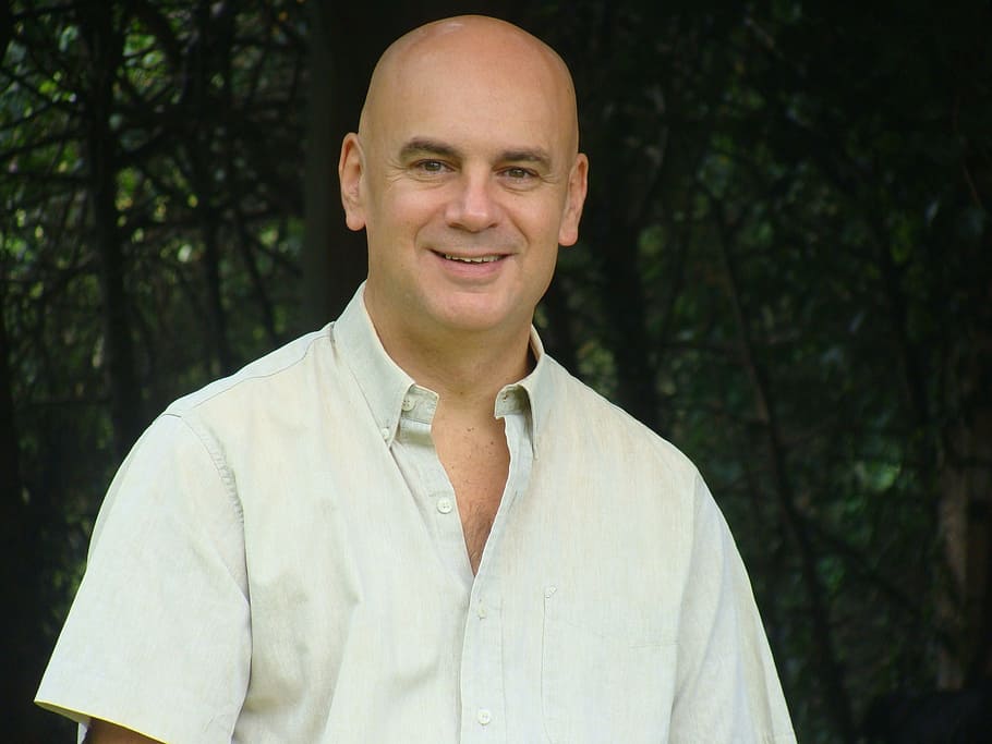 smiling man in white button-up T-shirt near trees, people, face HD wallpaper