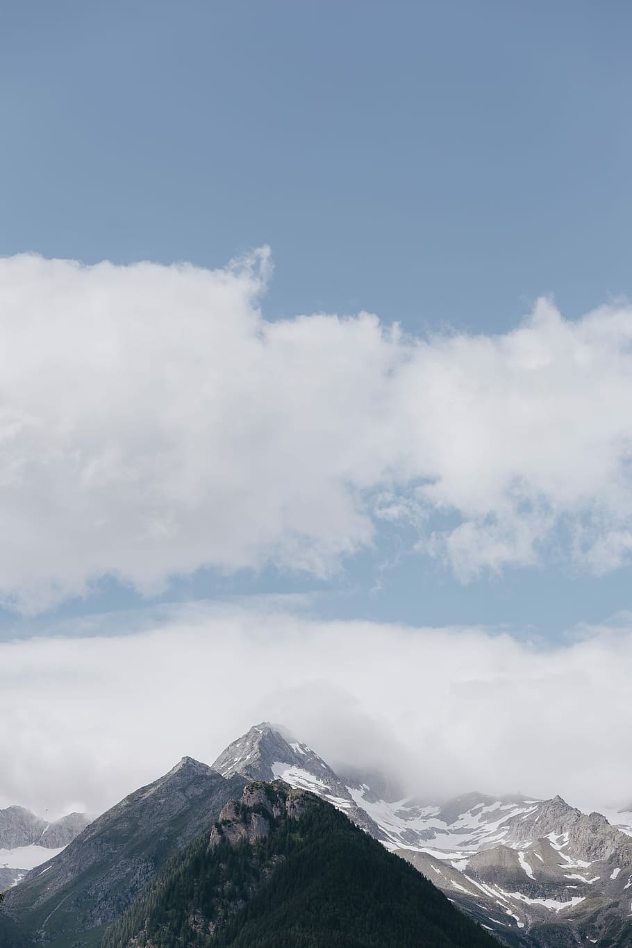 aerial photography of mountain range, mountain under white clouds HD wallpaper