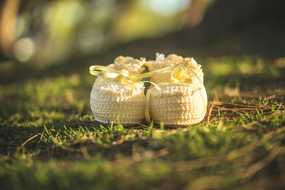 pair of baby's white shoes on grass, vegetation, evening, slipper, HD wallpaper