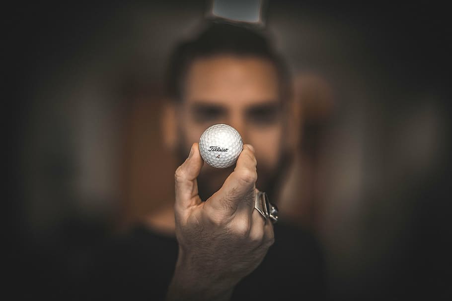 person holding golf ball, hand, macro, man, sport, practicing