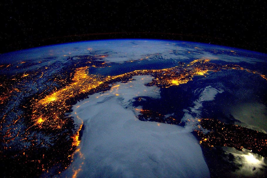 earth during nighttime photo taken from ISS, space view, italy