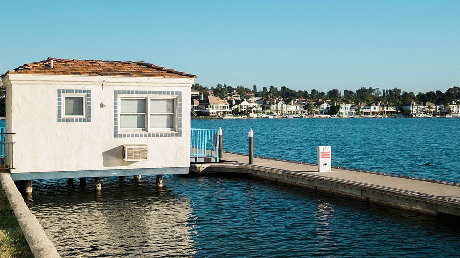 white painted house on body of water, white concrete house near brown wooden dock HD wallpaper