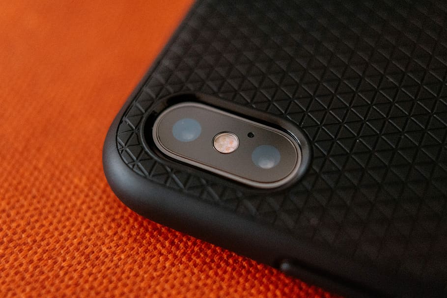black smartphone case, black Android smartphone on orange surface HD wallpaper