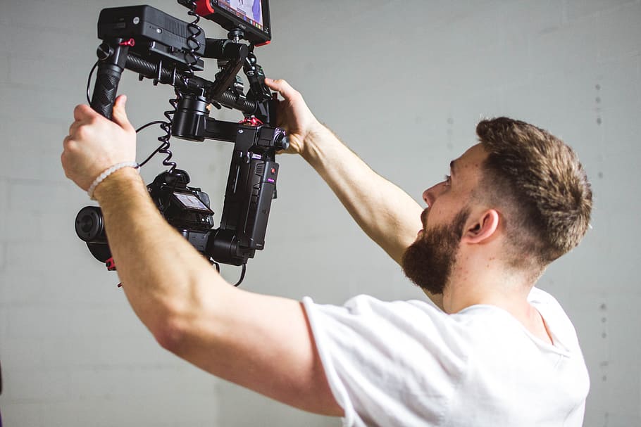 person holding camera, people, man, guy, operator, video, filmmaking HD wallpaper