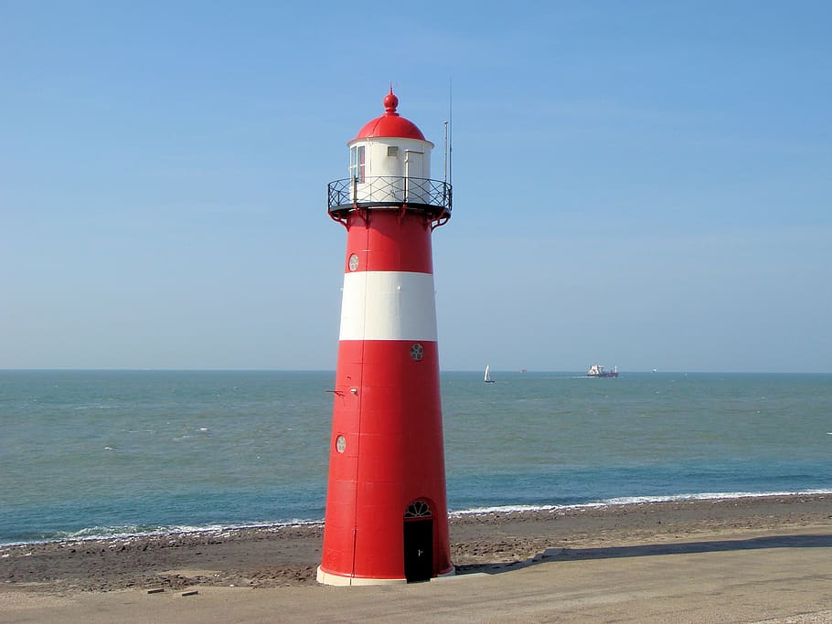red and white lighthouse near shore, netherlands, coast, blue sky HD wallpaper