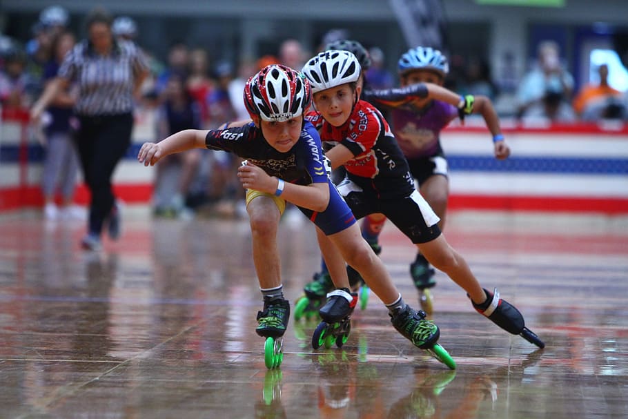 kids racing using inline skates, inline speed skating, roller speed skating