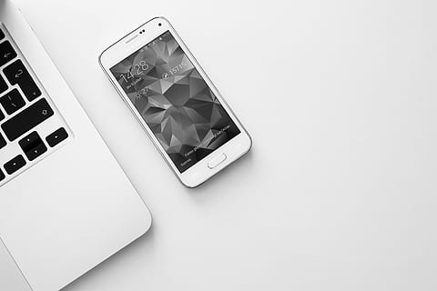 shimmery white Samsung Galaxy S5 mini beside MacBook, smartphone HD wallpaper