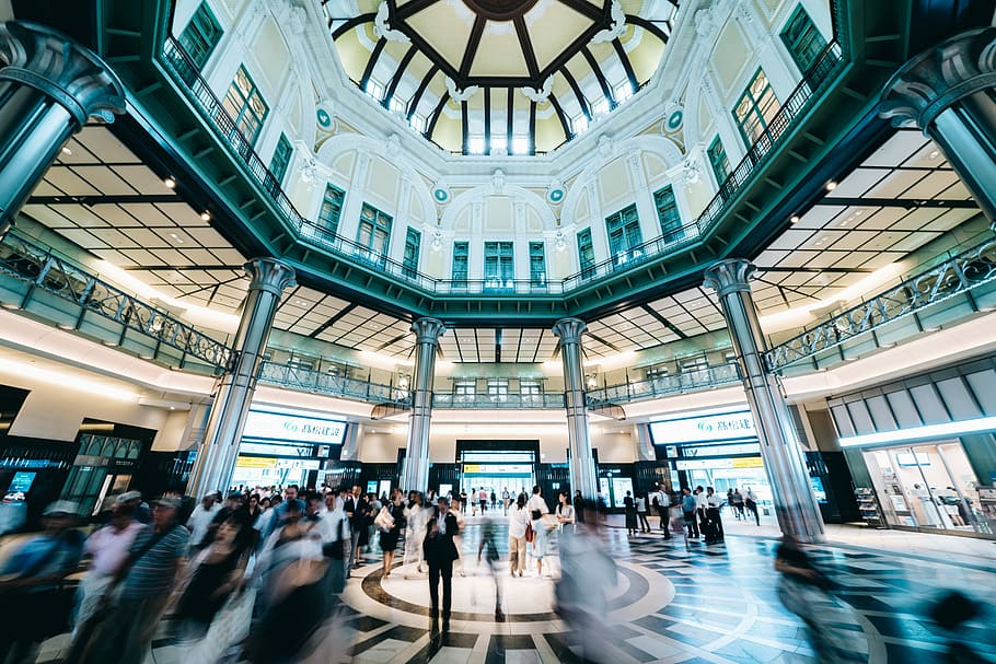 time lapse photography of a station, crowd of people inside the building HD wallpaper