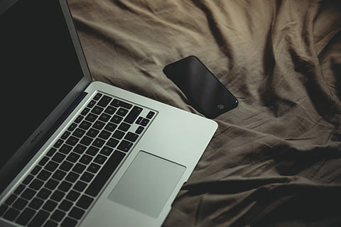 MacBook Air beside of black iPhone 7, MacBook Air beside post-2014 iPhone HD wallpaper