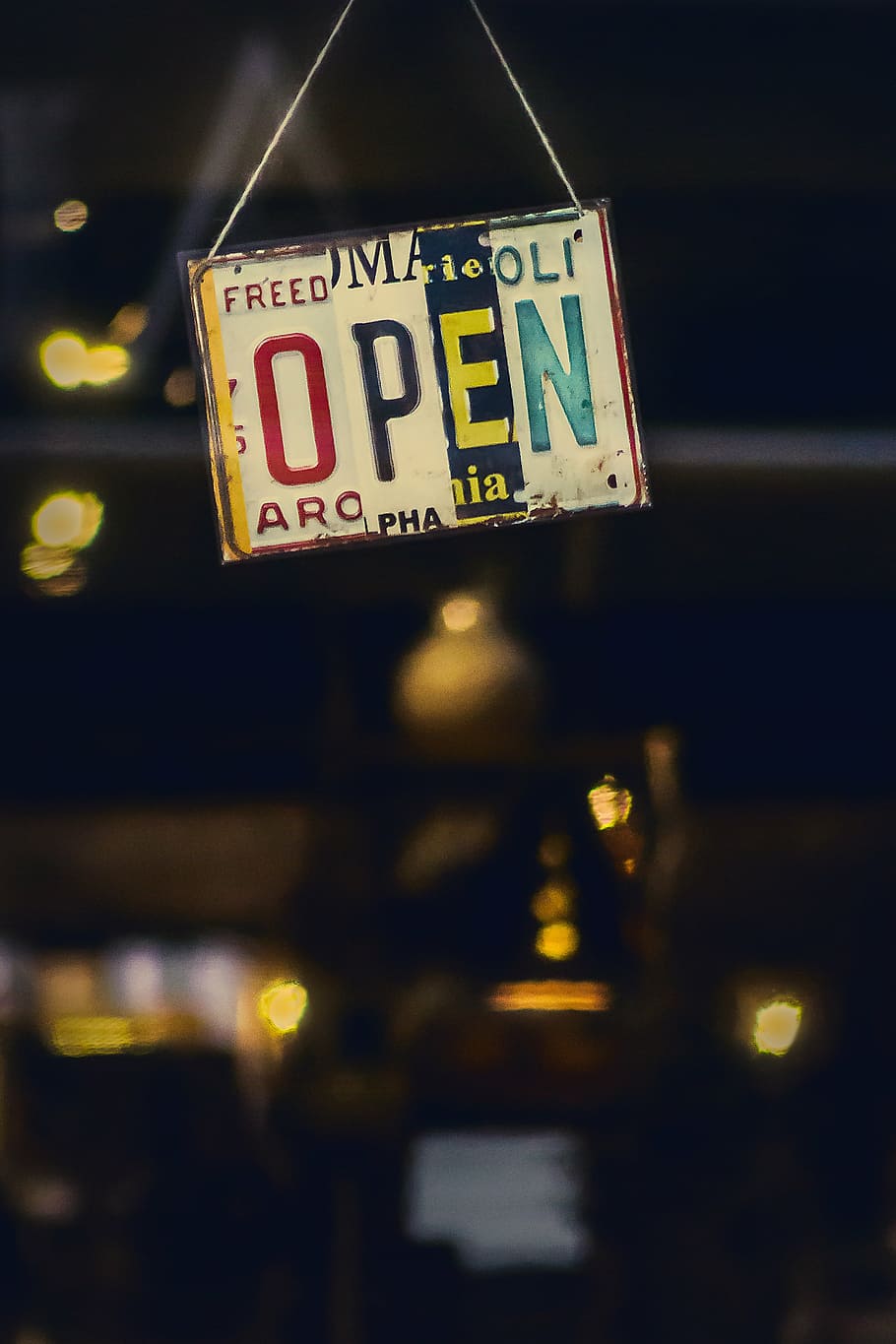 Open signage, dark, night, lights, bokeh, blur, establishment