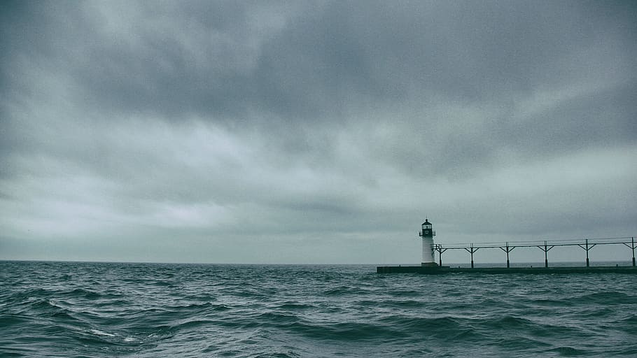 body of water, white lighthouse between calm body of water, Light House HD wallpaper