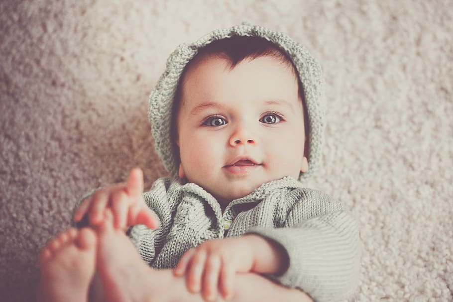 photograph photo of baby pointing finger on fleece mat, girl HD wallpaper