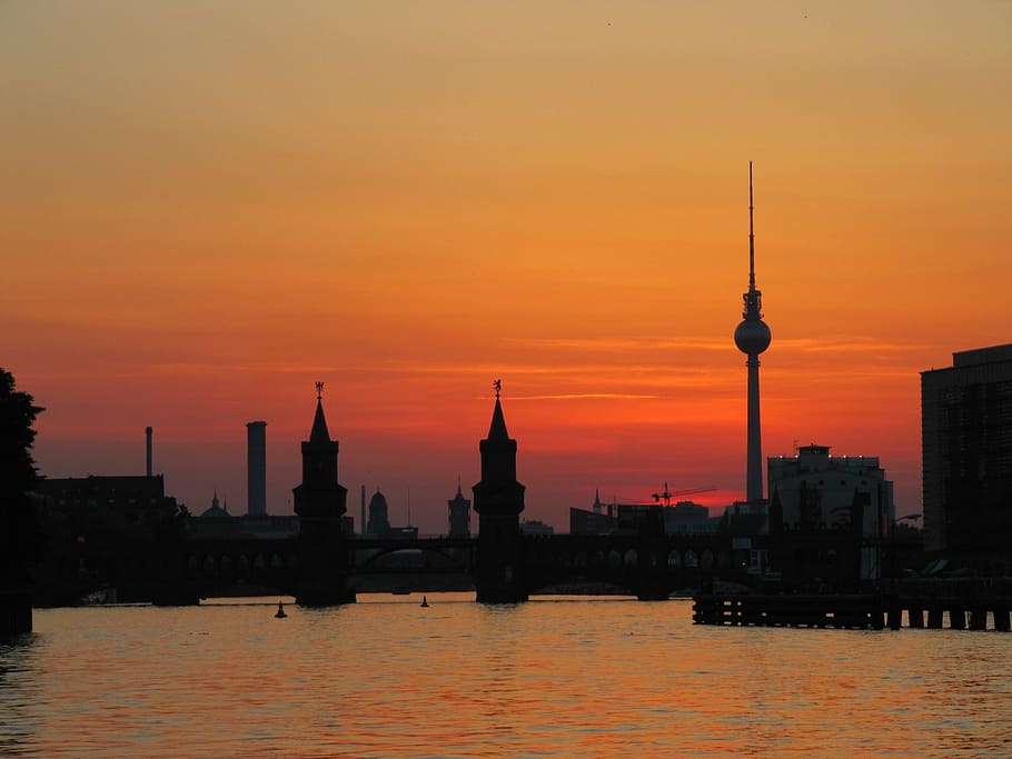 photo of city during golden hour, berlin, oberbaumbrücke, tv tower