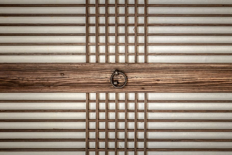 black steel ring on top of brown wooden plank, a straight line HD wallpaper