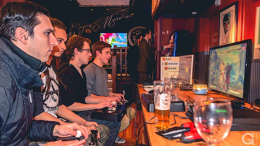 people, bar, men, playing, arcade, beer, fun, gaming, group, group of people