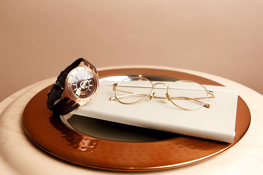 eyeglasses beside analog watch, minimal, simple, copper, detail HD wallpaper