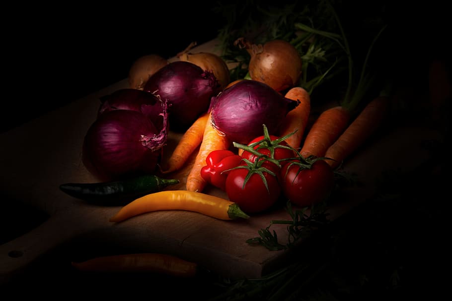 fruit arrangement, vegetables, dark mood, food photography, carrots