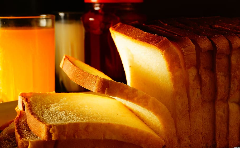shallow focus photography of sliced bread, breakfast, juice, jam