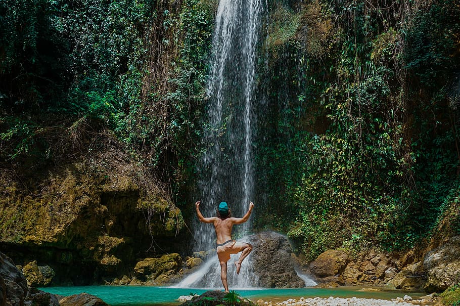 person standing near waterfalls, green, grass, trees, plants HD wallpaper