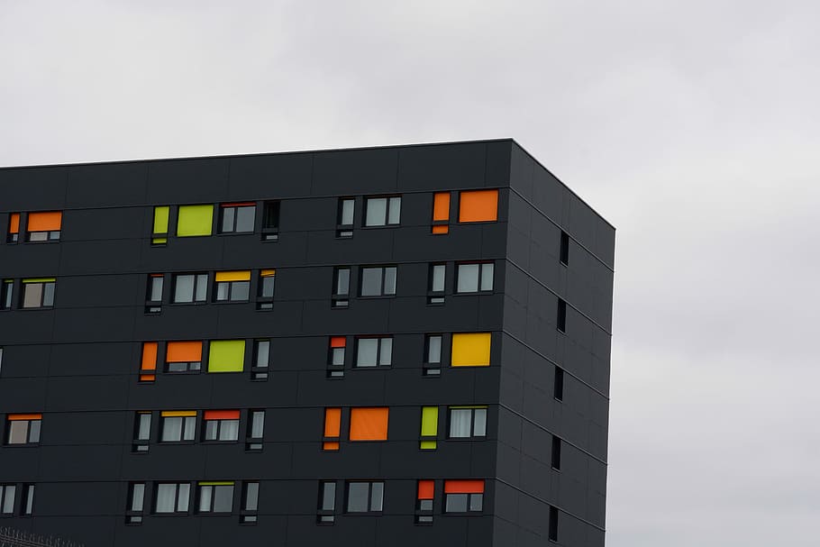 black concrete building, black painted building taken at cloudy morning HD wallpaper
