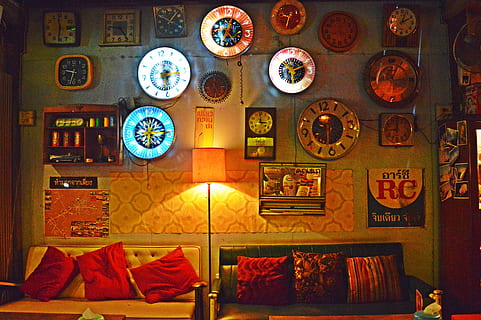 two vacant leather sofa in the room under wall clock lot, frame HD wallpaper