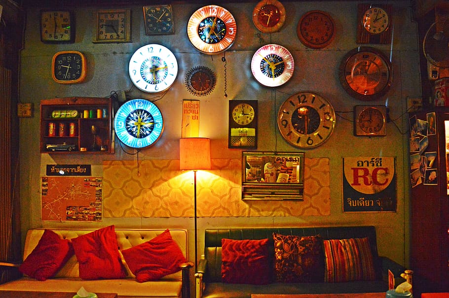 two vacant leather sofa in the room under wall clock lot, frame HD wallpaper
